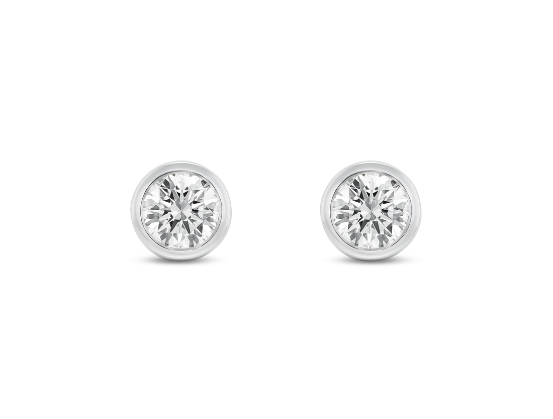 Front view of white 1 carat total weight round brilliant studs in a 14k white gold bezel setting